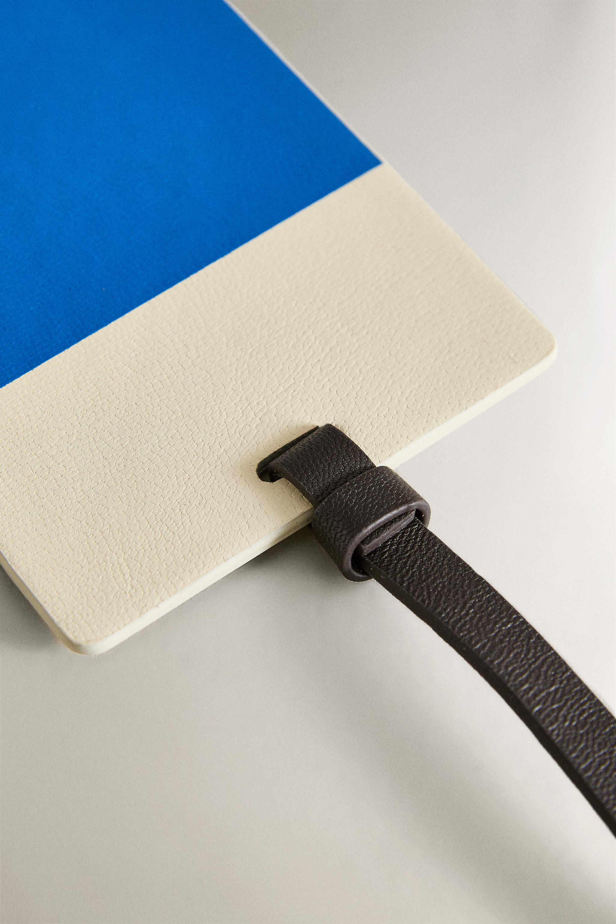 ÉTIQUETTE BAGAGE CUIR